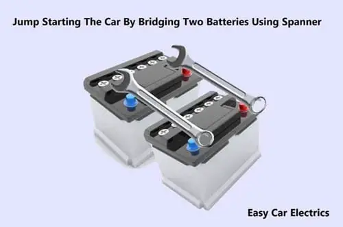 Jump Starting The Car By Bridging Two Batteries Using Spanner